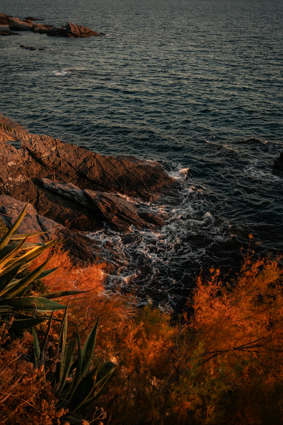 The meeting of rocky land and quiet water
